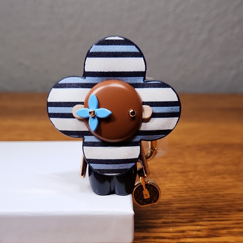 Striped Flower Charm Keychain with Blue Accent
